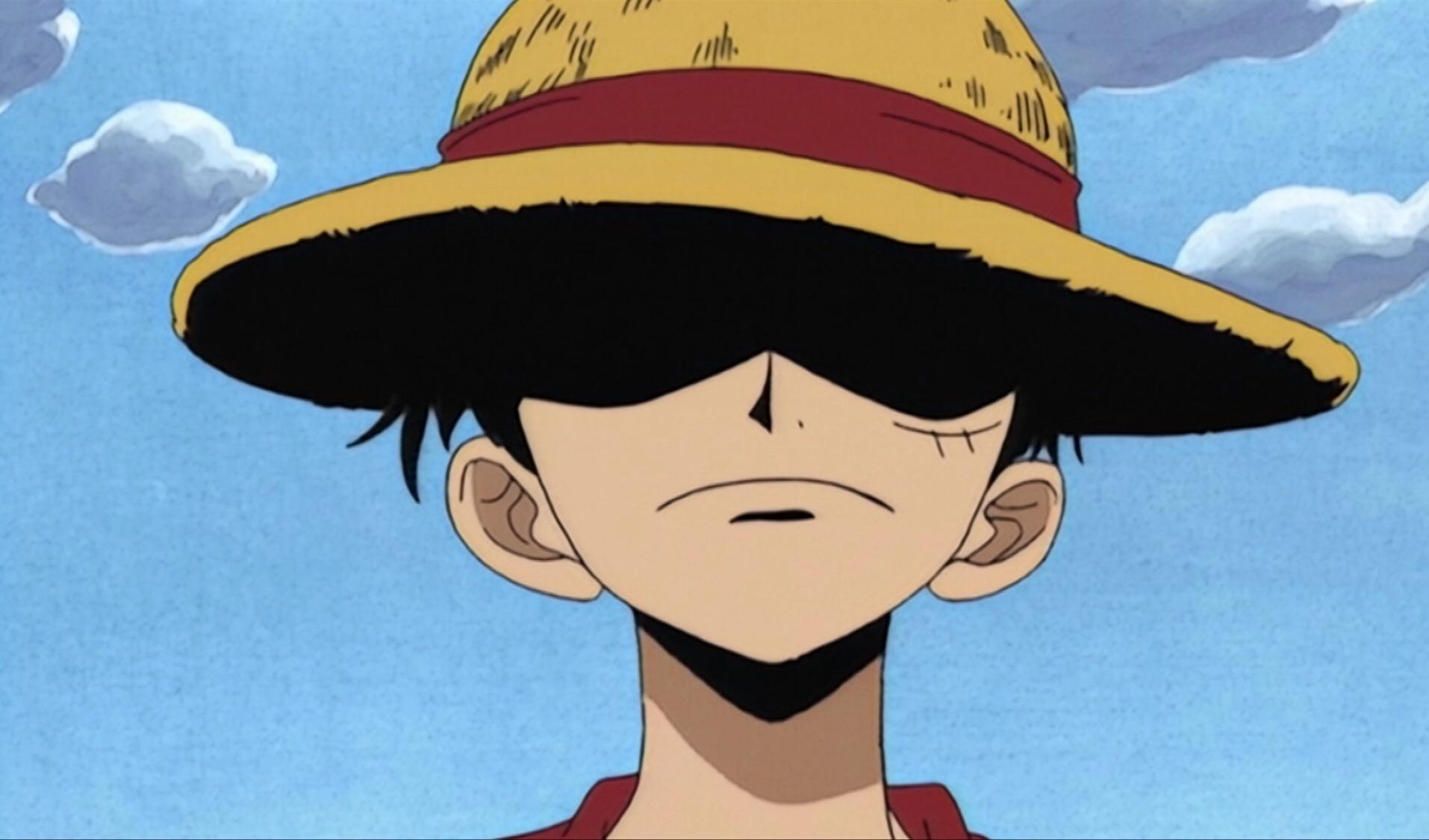 Hình ảnh Luffy với vành mũ rơm che khuất mắt